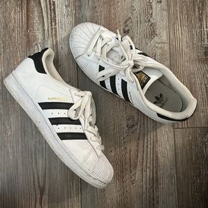 Adidas black and white superstar sneakers